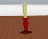 Gold taper candle in red