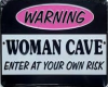 Woman Cave Sign
