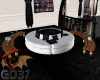 round sofa with tables
