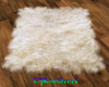 cream fur rug