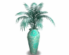 Teal leaves in teal vase