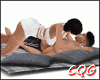 Couple Kissing In Bed