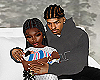 s. holding newborn
