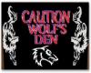 Caution Wolf's Den sign