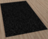 Black textured rug