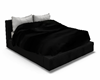 black poseless bed
