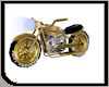 Motocyclette or / gold