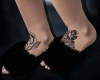 black slipper with tatto