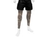 Black shorts + tattoo