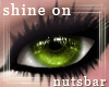 *n* shine on green eyes