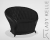 Tufted chair w/ poses