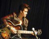 Elvis with guitar