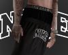 Short Black NK Tattoo
