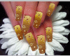 nails porcelana doradas
