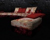 red stained mess couch