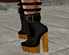 gold and black boots