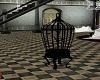 bird cage w/ black crows
