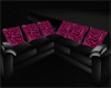 black/hot pink fur couch