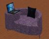 purple couch w/lap top