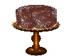 ^Chocolate cake on stand