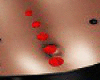 Red belly button piercin