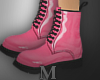 Pink martens boots.