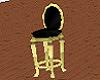 (k) gold and black stool