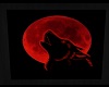 WOLF HOWLS AT RED MOON