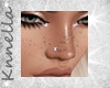 *K* Nose Piercing