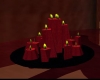 Red candles black plate